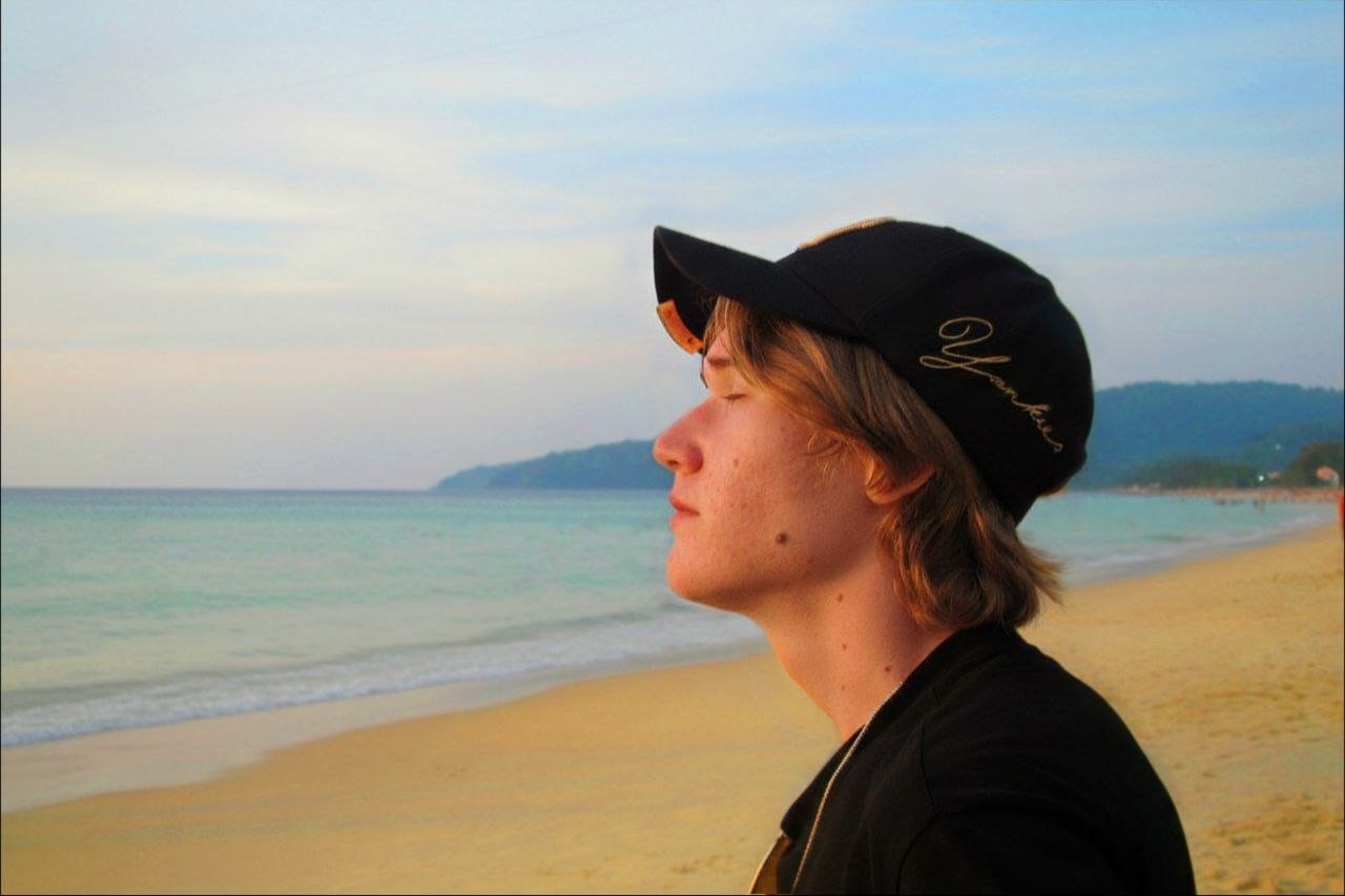 Alexander Anglichaninov — profile on the beach